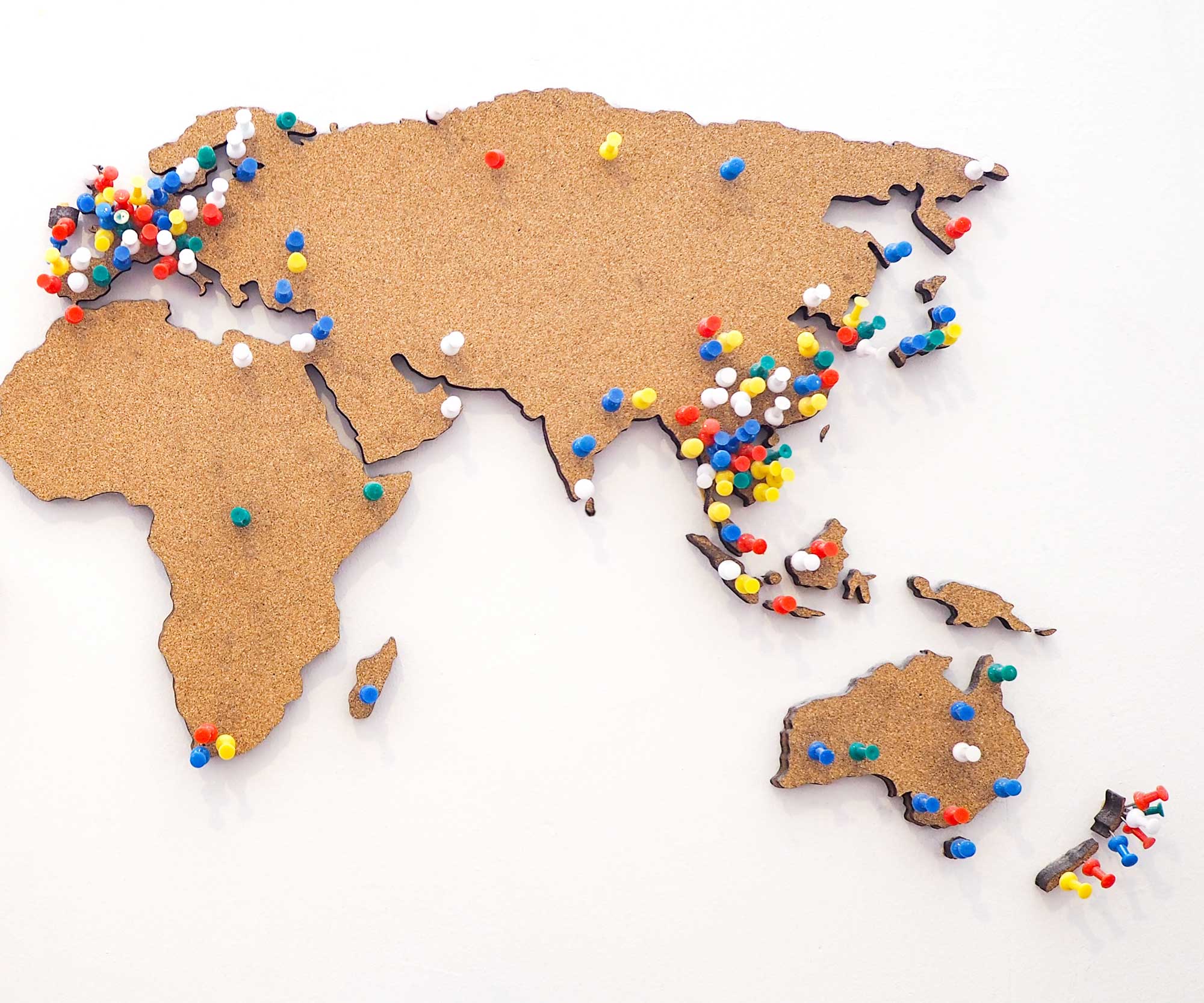 world map with coloured pins
